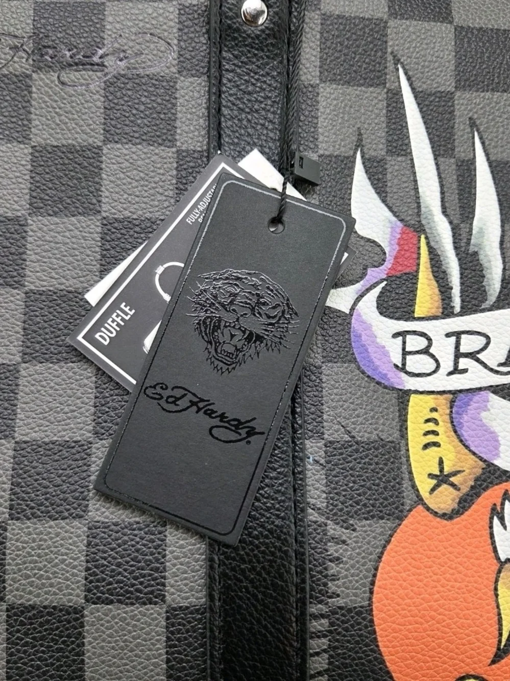 Ed Hardy Black and Gray Checkered Duffel with Brave Hearts Graphic